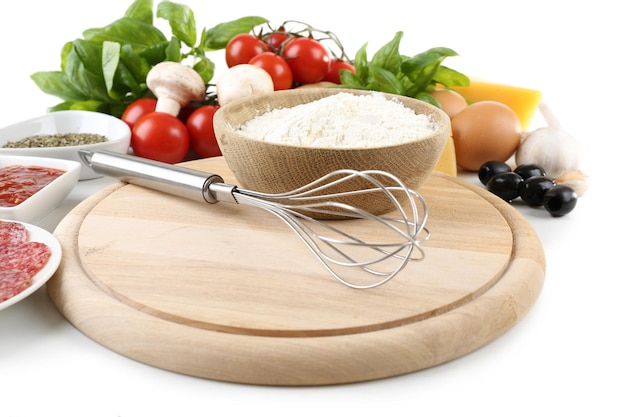 Assorted kitchen utensils and fresh ingredients